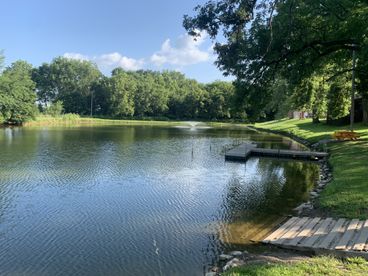 Pond with fountain and dock