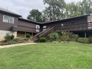 Lodge with wraparound deck and garden