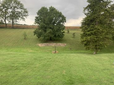 Outdoor worship area with a cross