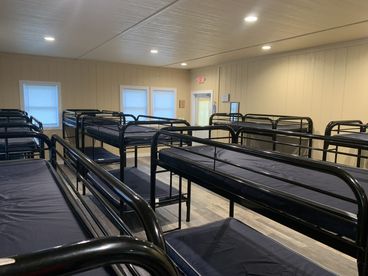 Bunk beds in a large bunk room